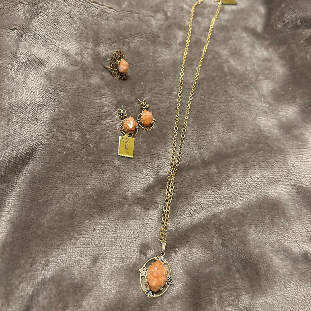 Women’s necklace, earrings, ring set. Coral antiques stones- simulated.